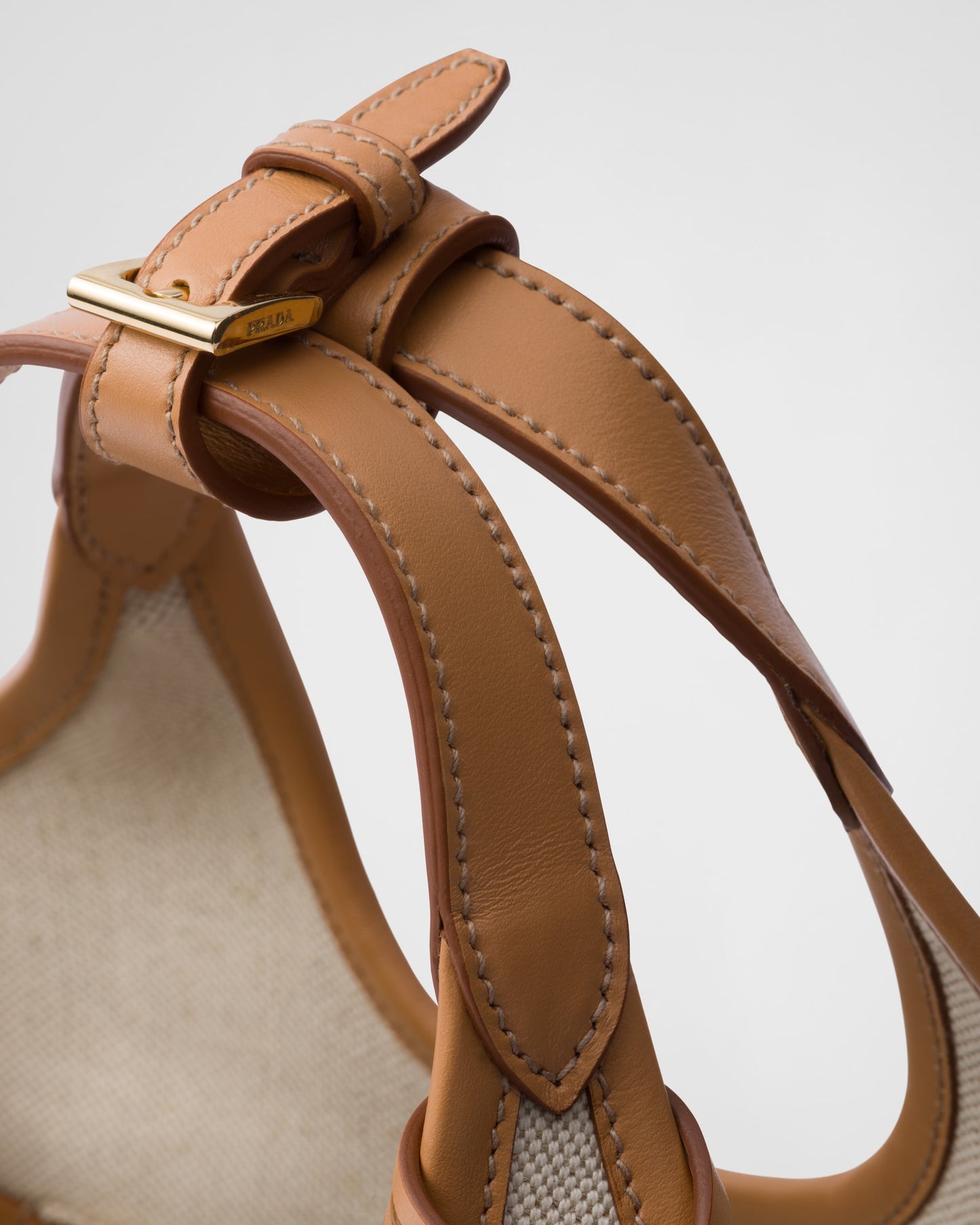 Prada Linen blend and leather mini-buckle bag